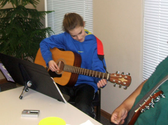 Take Guitar Lessons at Allegro Studios!